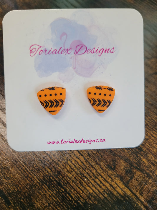 Orange and black studs